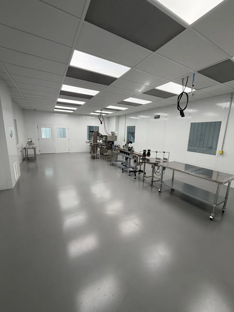 ISO7 clean room bottling and labeling line at Eagle Works supplement contract manufacturing facility Logan Utah